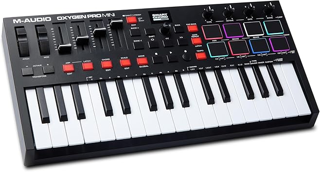 M-AUDIO Oxygen Pro Mini 32-Key USB MIDI Keyboard Controller for MacOS and WinOS, with Beat Pads, Assignable Knobs and Faders, and Native Instruments Sound Pack (NKS Integration)